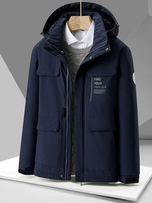 Navy hooded puffer jacket with chest graphic and multiple pockets.