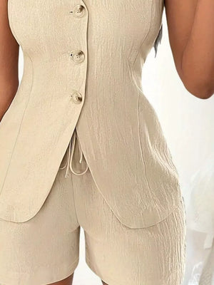 Tan button-down vest and shorts set with drawstring detail and textured fabric.