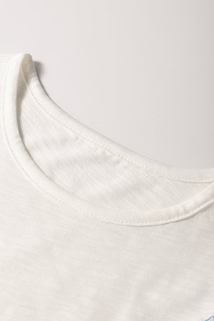 White embroidered tee with crew neck and flutter sleeves.