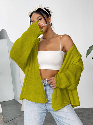 Yellow-green acrylic open-front slouchy knit cardigan with long sleeves.