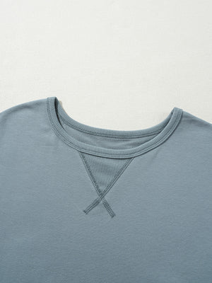 French blue cotton t-shirt dress with crew neck and contrast stitching detail.