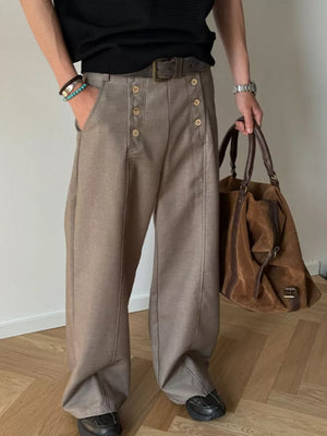 Mocha high-waisted wide leg pants with button detail and belt.