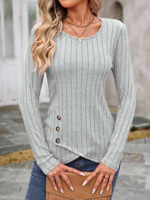 Gray ribbed knit top with round neck and button detail on the side.