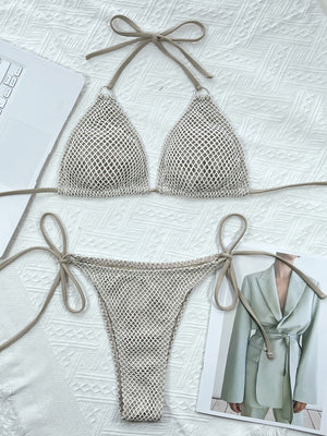 Crochet halter bikini set in ivory with tie sides and triangle cups.
