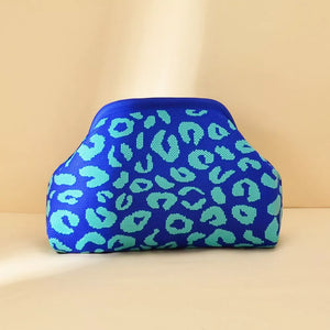 Vibrant knit clutch in blue with teal leopard print.