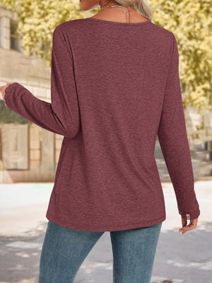 Burgundy long sleeve t-shirt with lace trim cuffs and neckline detail.