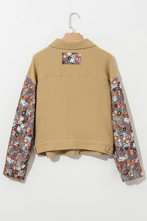 Waffle knit jacket in khaki with floral print sleeves and back panel detail.