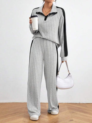 Light gray ribbed polo lounge set with contrast trim and snap button detail.