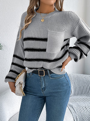 Gray striped knit sweater with chest pocket and crew neck.