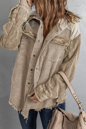 Colorblock corduroy hooded utility jacket in tan with frayed hem and chest pockets.