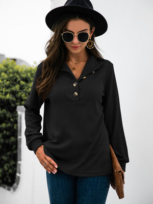 Black long sleeve tee with button neckline and collared detail.