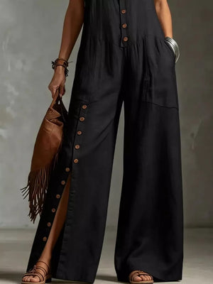 Black wide-leg jumpsuit with button details and pockets.