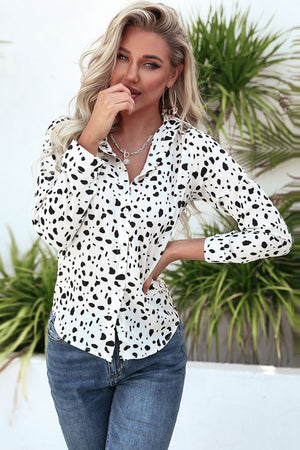 Dalmatian print button-up shirt in white with a knot-front detail.