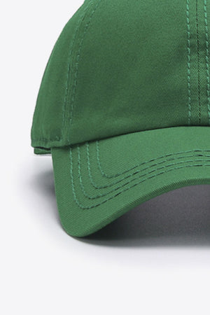 Green canvas baseball cap with stitched details