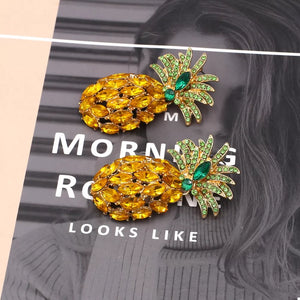 Pineapple dangle earrings with yellow and green rhinestones.