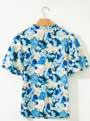 Vibrant floral print cotton blouse with puff sleeves and mock neck