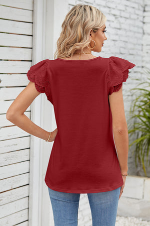 Rust eyelet flutter sleeve square neck top with a casual fit.