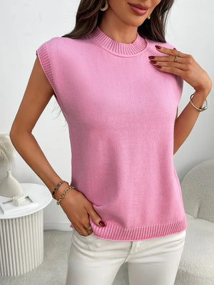 Pink ribbed knit sleeveless mock neck top with a casual fit.