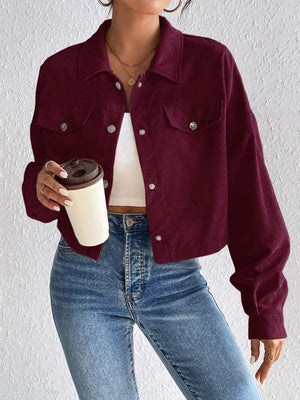 Burgundy corduroy cropped jacket with snap front and chest pockets
