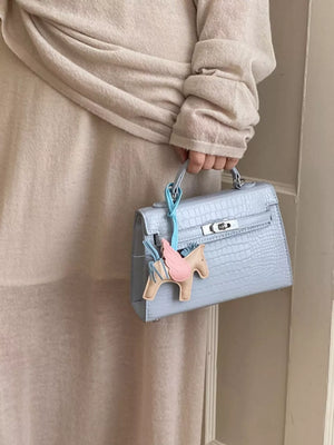 Crocodile Embossed Mini Crossbody Bag in Blue, front view