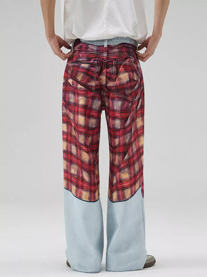 Men's wide-leg jeans with red plaid patchwork and light blue denim lower legs.