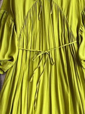 Light green polyester maxi dress with balloon sleeves, drawstring waist, and ruched neckline detail.