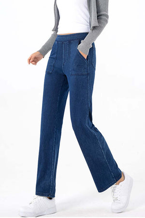 Dark wash denim straight leg jeans with utility pockets and a comfortable fit.