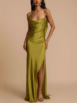Green satin cowl neck maxi dress with spaghetti straps and a high slit.