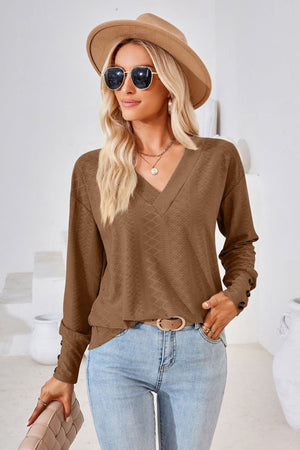 Brown textured v-neck blouse with button cuff detail