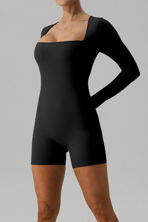 Black long sleeve unitard with square neckline and short legs.