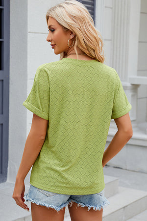 Light Green textured henley tee with rolled sleeves and allover eyelet pattern.