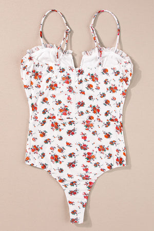 White floral bustier camisole with ruffle trim and adjustable straps