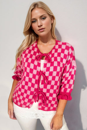Hot pink and blush pink checkered knit cardigan with tie front and ruffle sleeves