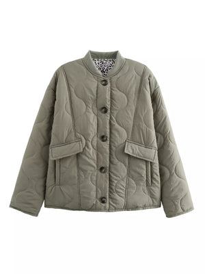 Moss green quilted button-down jacket with leopard print lining and chest pockets.