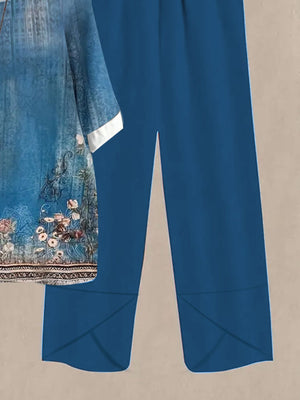 Floral print half sleeve top and solid blue pants set.