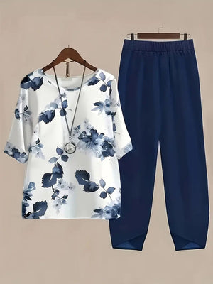 Floral print half sleeve top set with dark blue pants