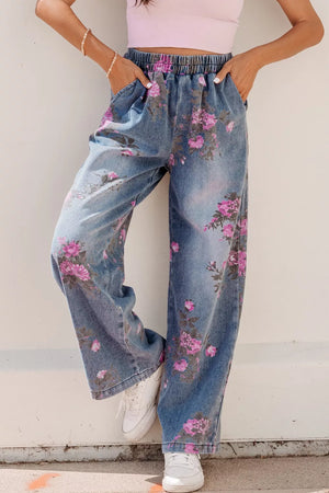 Floral wide-leg jeans in denim with an elastic waistband and pink floral print.