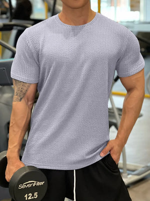 Gray textured performance crew neck tee with short sleeves.
