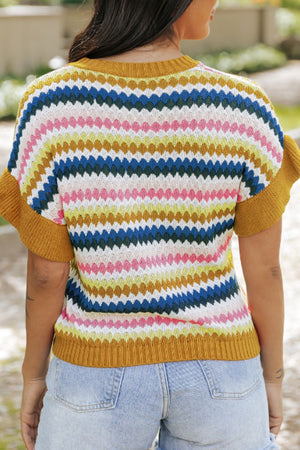 Textured stripe knit sweater in multicolor with mustard trim and short sleeves.