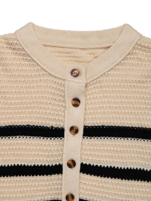 Waffle knit henley sweater in tan with black stripes and button front.