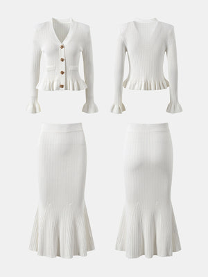 White knit cardigan with ruffled hem and bell sleeves, paired with a matching mermaid skirt.