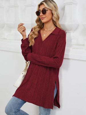 Burgundy ribbed knit collared tunic with slit hem and long sleeves.