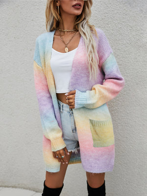 Rainbow gradient knit cardigan with pockets, open front, long sleeves, and pastel colors.