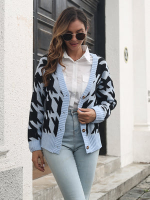 Geometric houndstooth v-neck cardigan in Misty Blue acrylic with button front.