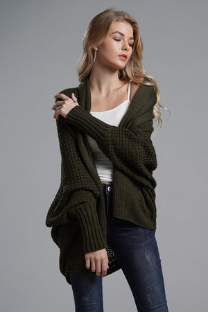 Dark Green acrylic cocoon knit sleeve cardigan with ribbed cuffs and open front.