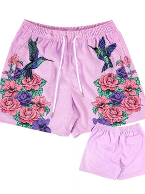 Pink purple mesh athletic shorts with hummingbird and floral print, drawstring waist
