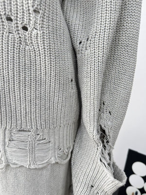 Light gray distressed cotton sweater set with deconstructed details and ripped accents.
