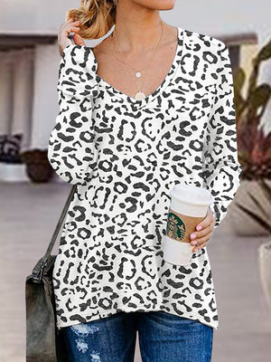 White leopard print V-neck long sleeve top with side zip detail