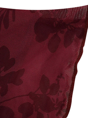 Burgundy floral mesh bodycon mini dress detail showing sheer fabric with dark floral pattern.