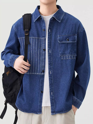 Men's light blue denim overshirt with chest pocket and vertical stripe detail